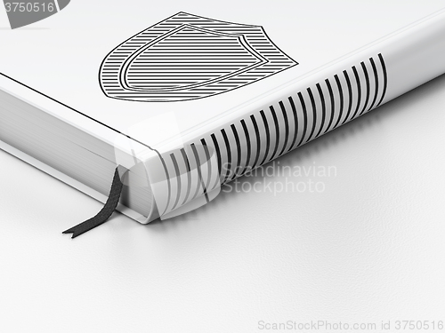 Image of Privacy concept: closed book, Shield on white background
