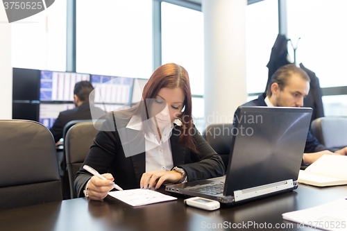 Image of Business people in modern office.