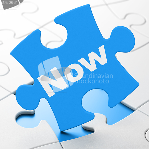 Image of Time concept: Now on puzzle background