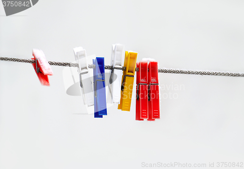 Image of Colorful plastic clothespins