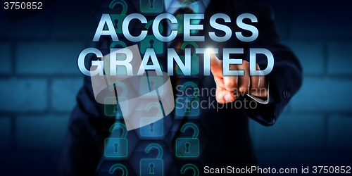 Image of Corporate User Touching ACCESS GRANTED Onscreen