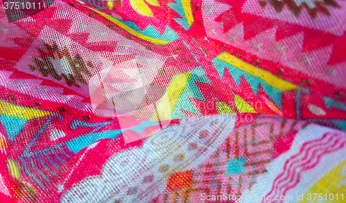 Image of Closeup of fabric texture with colorful pattern 