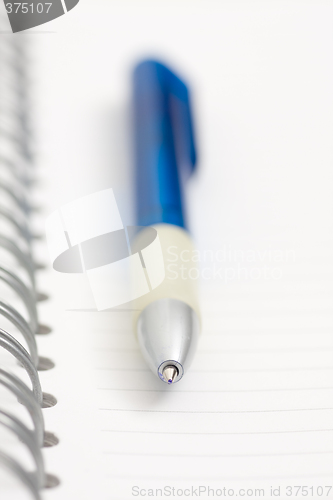 Image of pen on notebook