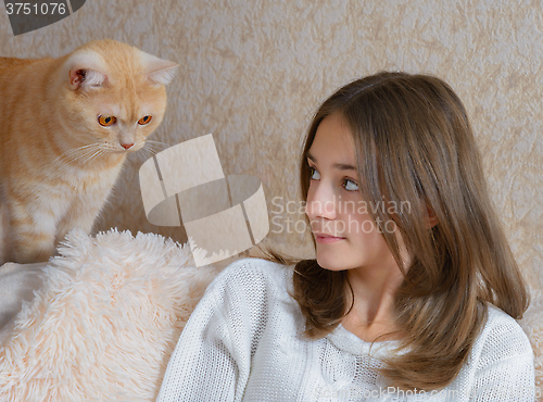 Image of Girl and red cat