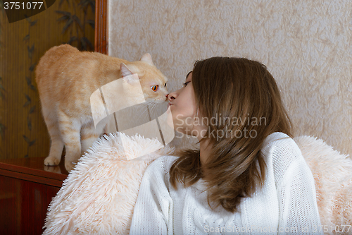 Image of Girl and red cat