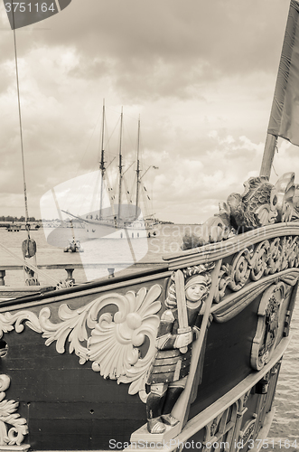 Image of Old sailboat in the harbor, sepia