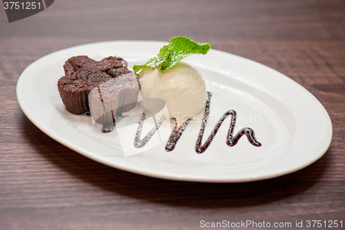 Image of chocolate cake with ice cream