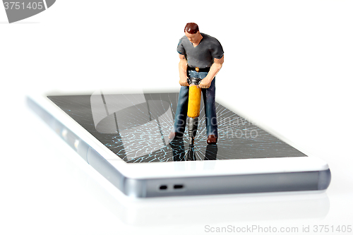 Image of Worker breaking smart phone 