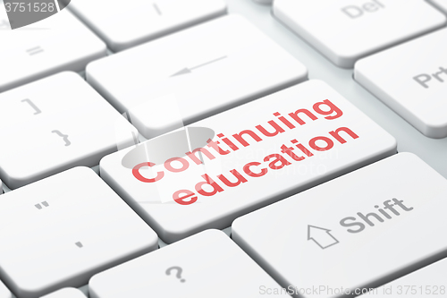 Image of Studying concept: Continuing Education on computer keyboard background