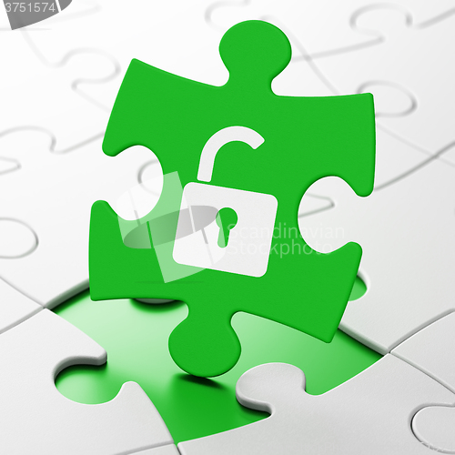 Image of Safety concept: Opened Padlock on puzzle background