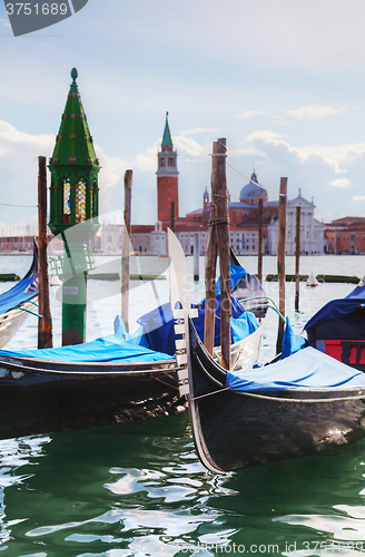 Image of Gondolas floating in the Grand Canal