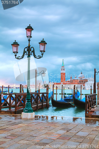 Image of Gondolas floating in the Grand Canal