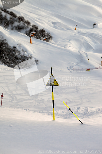 Image of Ski slope at evening after snowfall