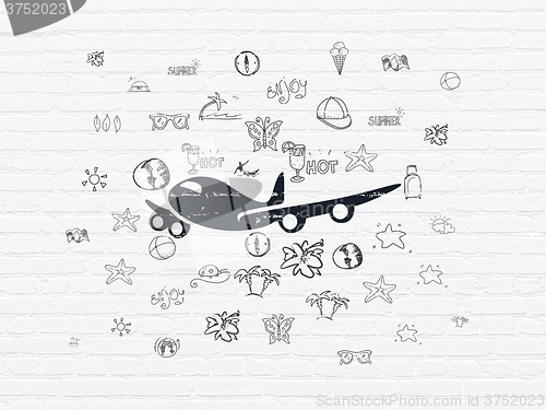 Image of Vacation concept: Airplane on wall background