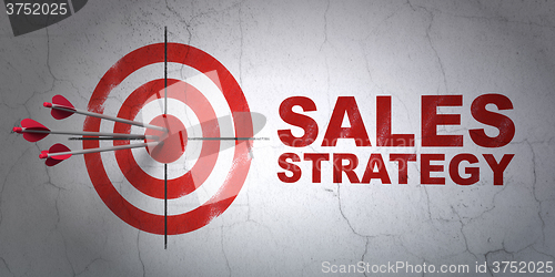 Image of Advertising concept: target and Sales Strategy on wall background