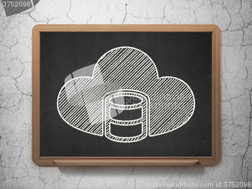 Image of Cloud computing concept: Database With Cloud on chalkboard background