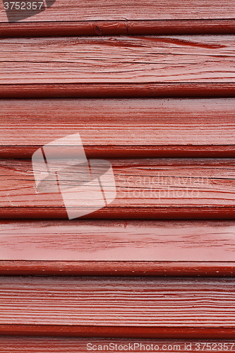 Image of brown painted fir boards