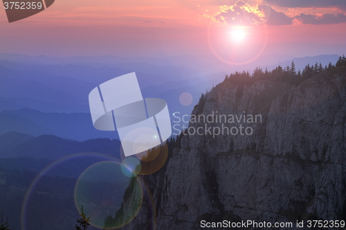 Image of beautiful sunset over the mountain