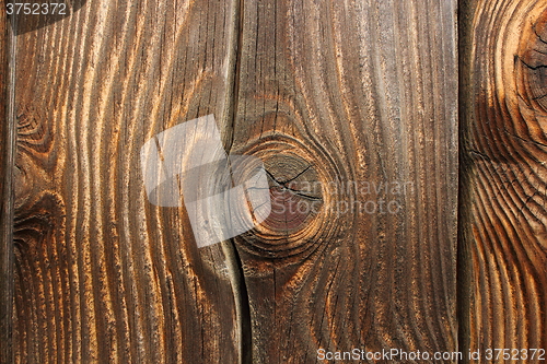 Image of knotted wood spruce plank