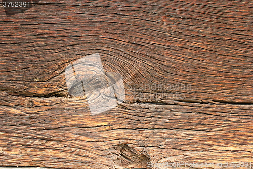 Image of knot on beautiful old oak plank