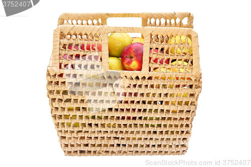 Image of wicker basket full of colorful apples