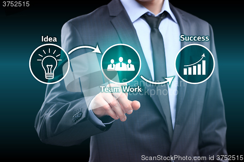 Image of businessman pressing idea team work success virtual button. concept