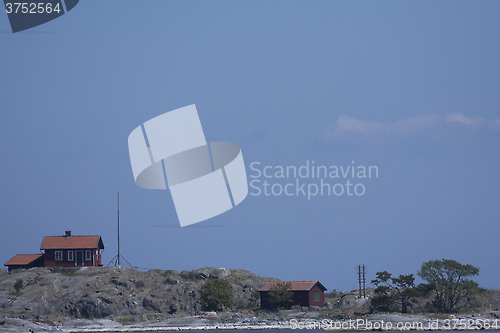 Image of house on small island