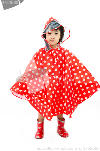 Image of Chinese Little Girl Wearing raincoat and Boots