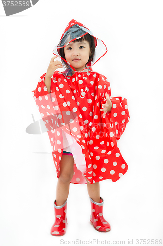 Image of Chinese Little Girl Wearing raincoat and Boots