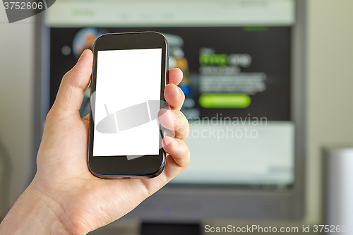 Image of Closeup of Man's Hand holding a Smartphone