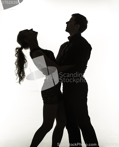 Image of The silhouette of romantic couple