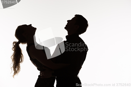 Image of The silhouette of romantic couple