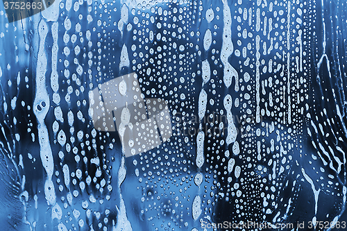 Image of Abstract texture with soap foam pattern on glass