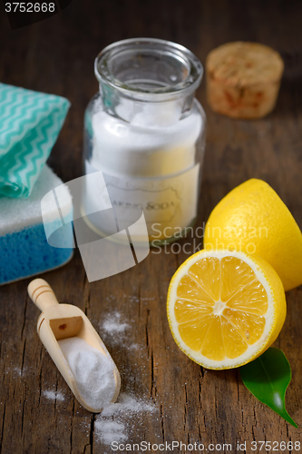 Image of Natural cleaning tools lemon and sodium bicarbonate