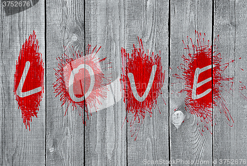 Image of Word "Love" on a wooden wall