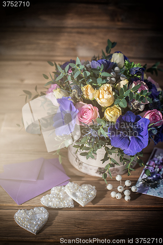 Image of beautiful bouquet flowers and hearts 