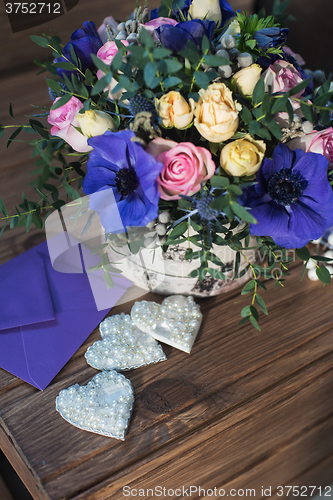 Image of beautiful bouquet flowers and hearts 