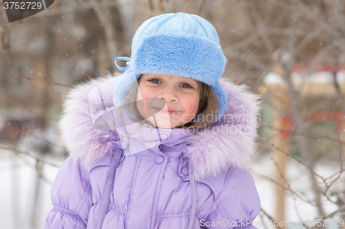 Image of Portrait of a Girl in snowy winter weather