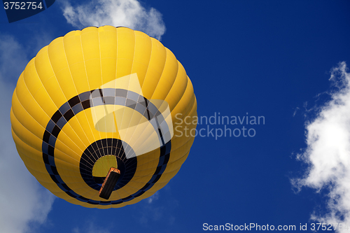 Image of Hot air balloon on blue sunlight sky