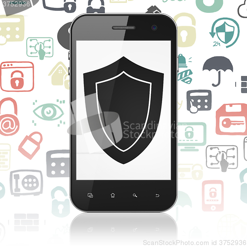 Image of Security concept: Smartphone with Shield on display