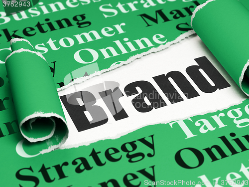 Image of Advertising concept: black text Brand under the piece of  torn paper