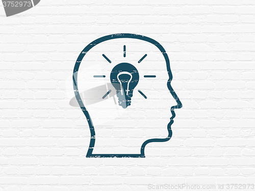 Image of Data concept: Head With Lightbulb on wall background