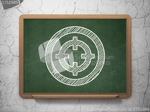 Image of Business concept: Target on chalkboard background