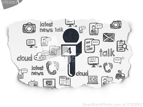 Image of News concept: Microphone on Torn Paper background