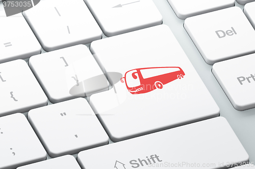 Image of Travel concept: Bus on computer keyboard background