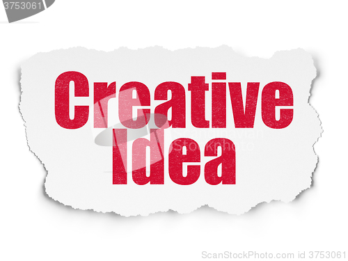 Image of Business concept: Creative Idea on Torn Paper background