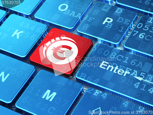 Image of Banking concept: Euro Coin on computer keyboard background
