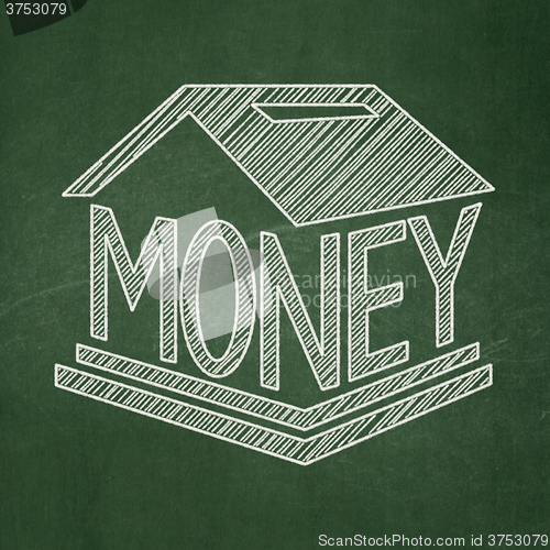 Image of Currency concept: Money Box on chalkboard background