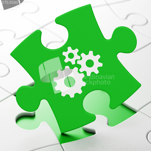 Image of Business concept: Gears on puzzle background