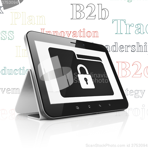Image of Finance concept: Tablet Computer with Folder With Lock on display